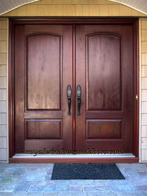 Photos by joe traina photo of a large rustic entrance in tampa with light hardwood flooring, a double front door, a medium wood front door and brown floors. Double Solid Door in Fiberglass.Painted in Wood finish ...