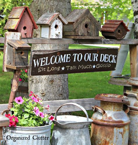 Pin by ellen engle on useful junk pinterest recycled garden art recycled garden garden art. Decorating the Deck with Rustic Birdhouses | Organized Clutter