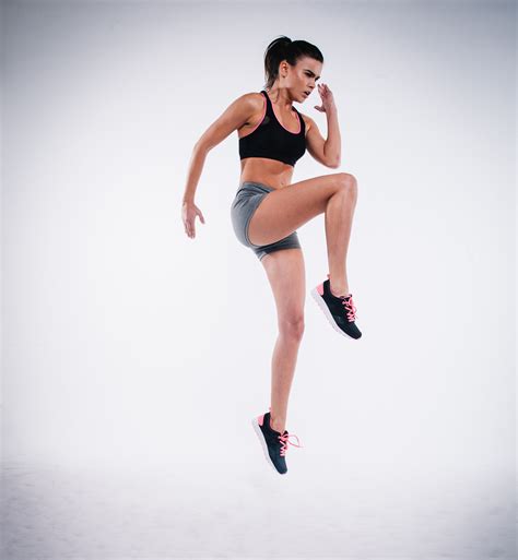 Athletic Woman Doing Plyometrics High Knees Exercise