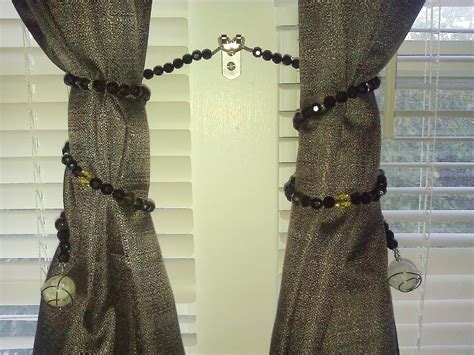 Follow the steps to know how. Inspired and "On-The-Cheap": DIY Beaded Wire Curtain Tie-Backs