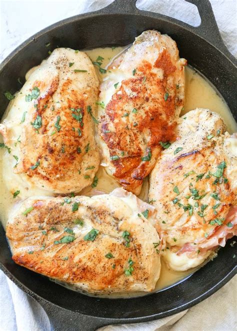 There's a reason boneless chicken breast recipes are in everyone's dinner arsenal. Ham Cheese Stuffed Chicken Breast in Sauce - Julie's Eats & Treats