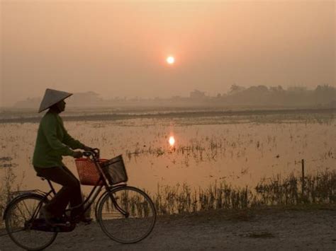 Bicycle In The Morning Mist At Sunrise Limestone Mountain