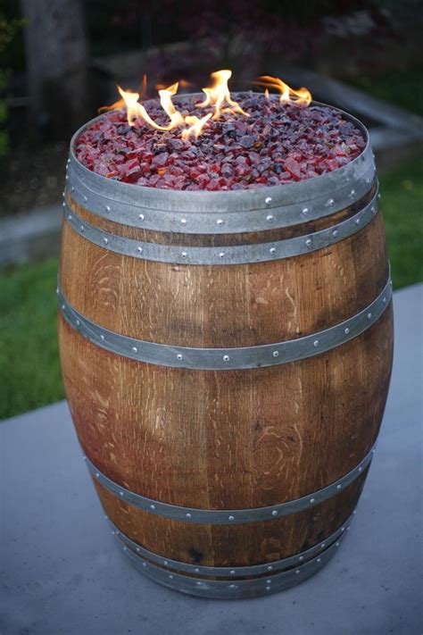 The cosmo gas fire pit table combines the ambiance of a fire pit with an outdoor dining table, making it perfect for backyard meals or drinks around the fire. Wine Barrel Fire Pit Kit | Wine barrel fire pit, Barrel fire pit, Fire pit