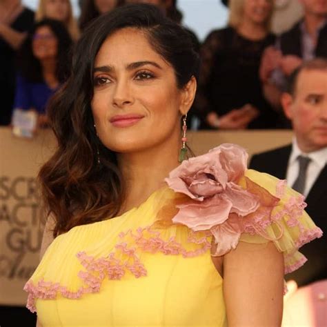 salma hayek wears dreamy one shouldered ruffled gucci gown