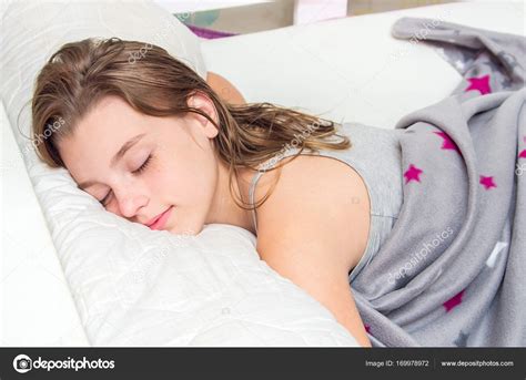 Beautiful Teen Girl Sleeping In Bed Portrait Stock Photo By