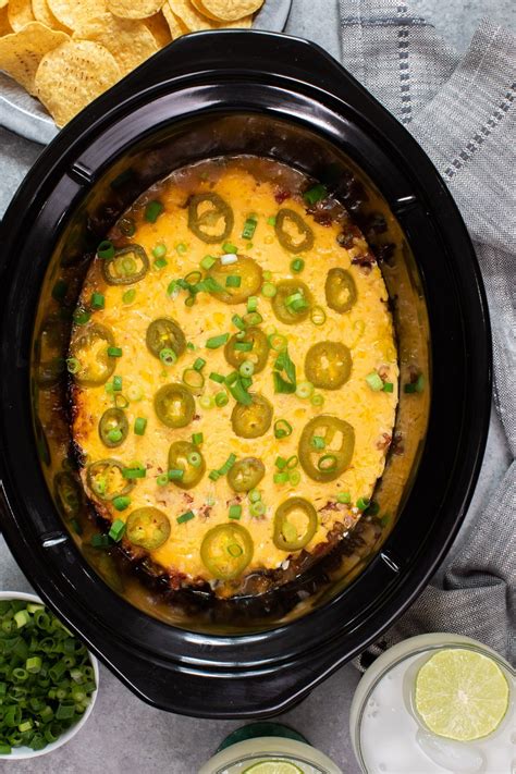 Slow Cooker 7 Layer Bean Dip Hot And Gooey The Magical Slow Cooker