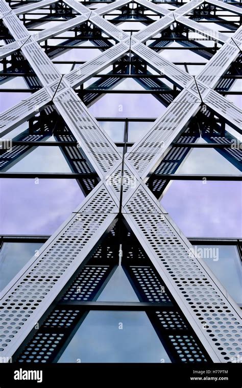 Futuristic Facade Of A Glass And Steel Office Building In Downtown