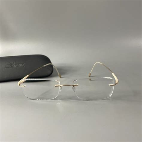 Silhouette Accessories Silhouette 779 Chassis Goldtone Eyeglasses Frameless Frame With Case