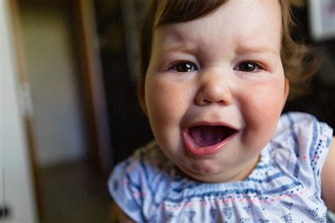 Chubby Infant Baby Starts To Crying By Stocksy Contributor Giorgio Magini Stocksy