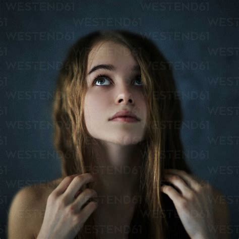 Caucasian Teenage Girl Looking Up Stock Photo