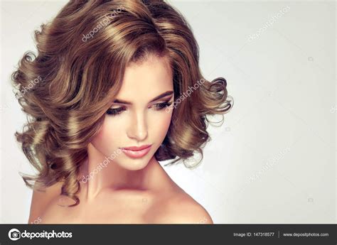 Beautiful Model Girl With Curly Hair Stock Photo By ©edwardderule 147318577