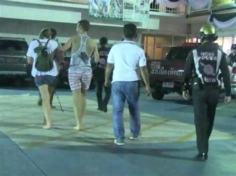 British Tourists Frogmarched Naked Along Pattaya Beach After Being Accused Of Sea Sex