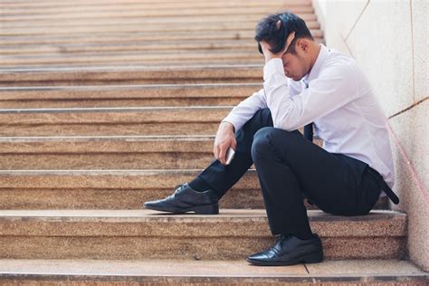 Premium Photo Young Businessman Crying Abandoned Lost In Depression