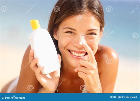 Suntan Lotion Woman Applying Sunscreen Solar Cream Stock Photo Image Of Care Blue