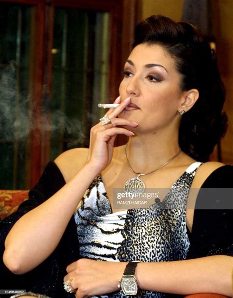 Egyptian Actress Ghada Abdel Razek Smokes A Cigarette During An News Photo Getty Images