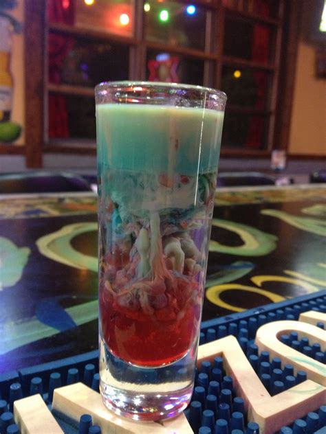 alien brain hemorrhage shot 1 2 a shot of peach schnapps with baileys on top then carefully