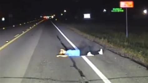 Intoxicated Woman Sleeping On Texas Road Narrowly Escapes Being Hit By Cars Dashcam Video Shows