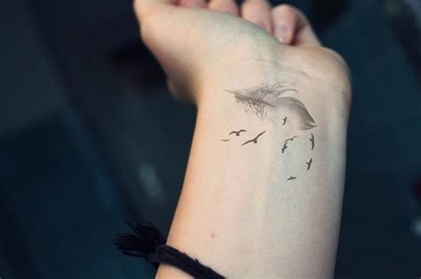 Bird wrist tattoos are cool and look very stylish and trendy. Feather n birds tattoo on wrist 2 - Tattoos Book - 65.000 ...