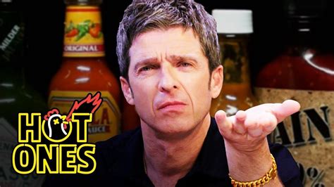 Watch Noel Gallagher Master Flaming Drumsticks And Spicy Conversation On FirstWeFeast Hot Ones