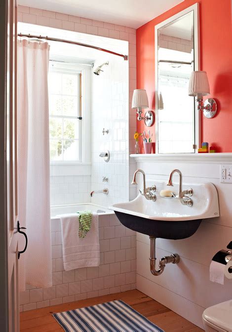 Faucets pieced together from salvage yard finds, vintage french tiles, and a tall antique maid's cabinet underscore the room's collected charm. Cute Bathroom & Life Threatening Emergency - The Inspired Room