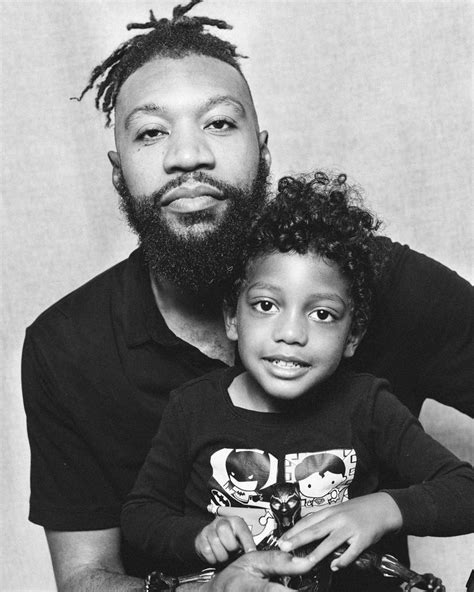 Photo Series Highlights The Intimate Bond Between Black Fathers And