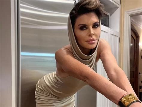 Lisa Rinna 59 Flaunts Her Toned Body In A Slinky Hooded Bronze Gown