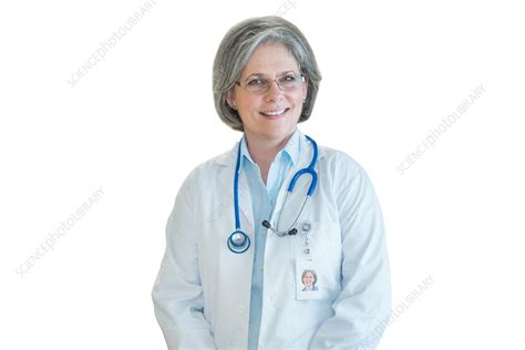 Mature Female Doctor Smiling Stock Image F020 5458 Science Photo Library