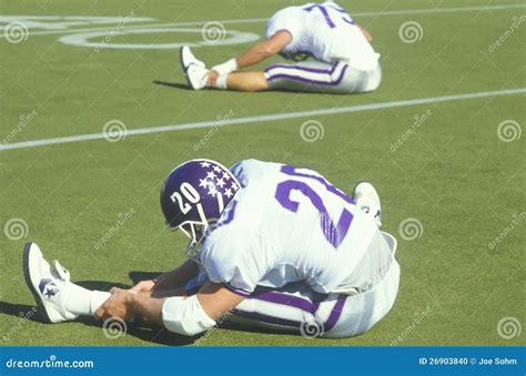 Football Player Stretching On Field Editorial Image Image Of Color