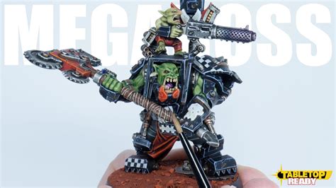 How To Paint An Ork Warboss In Mega Armour In The Clan Colours Of The