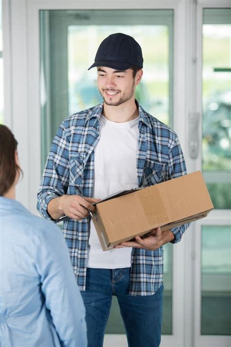 Delivery Man With Parcel Near Cargo Truck Shipping Service Stock Photo