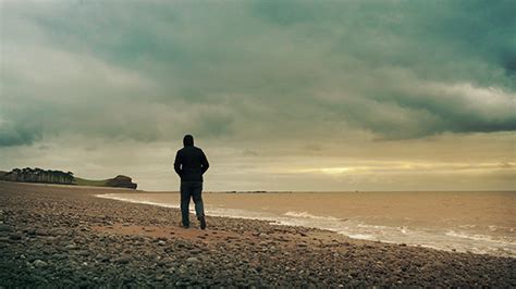 Man Walks Along Sunset Beach By Rockfordmedia Videohive