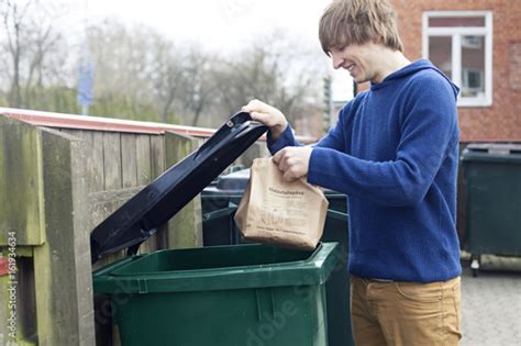 Guy Throwing Out Trash Stock Photo And Royalty Free Images On Fotolia