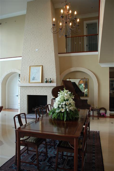 Grand Painted Brick Fireplace Modern Dining Room