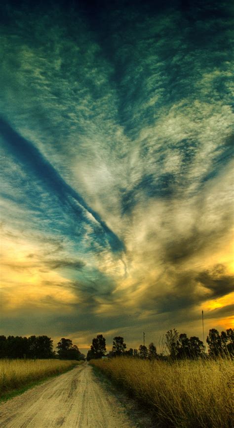 Download 1440x2630 Wallpaper Sky Sunset Beautiful Scenery Road