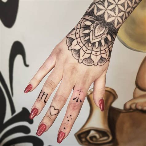 Ladies Hand Tattoo Ideas Hand Tattoos Rosaiskara