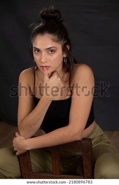 Portrait Seated Darkhaired Model Looking Camera Stock Photo Shutterstock