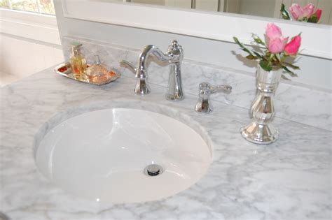 A cultured marble vanity top includes an integral sink that comes attached to the counter itself. White Cultured Marble Carrera Bathroom Vanity Tops Include ...