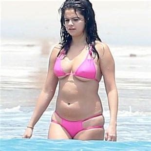 Selena Gomez Stuffs Her Fat Ass Into A Bikini