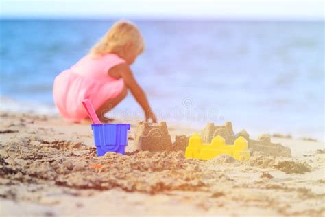 Kids Toys And Little Girl Building Sandcastle Stock Image Image Of