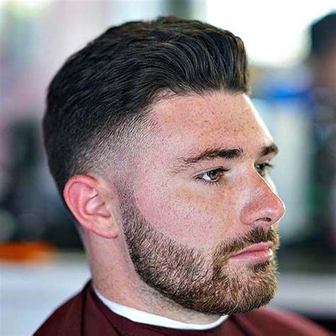 Dapper Haircut Low Fade With Thick Brushed Up Hair Temp Fade Haircut