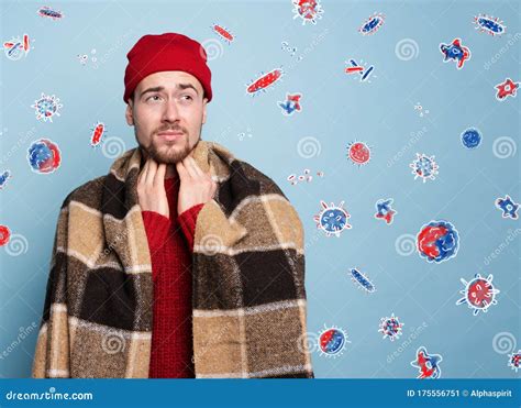 Boy Caught A Cold And Is Surrounded By Viruses And Bacteria Studio On