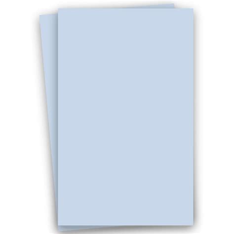 Two Sheets Of Light Blue Paper On A White Background