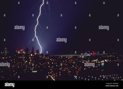 Lightning Bolt Hitting The Ground In A Big City Stock Photo Alamy