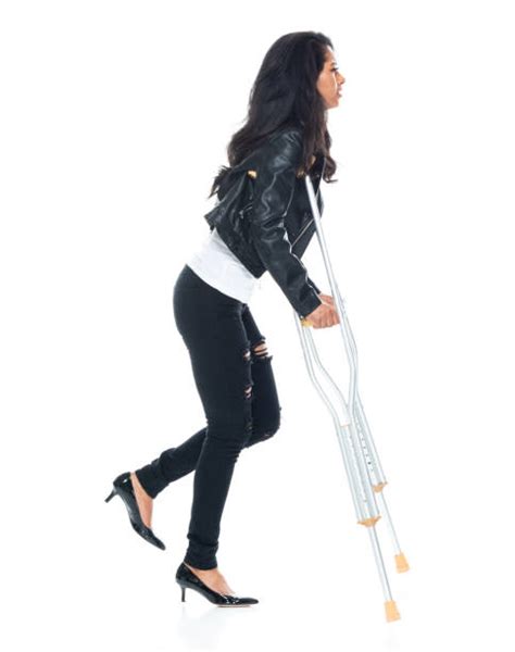 Young Woman With Crutches Stock Photos Pictures And Royalty Free Images