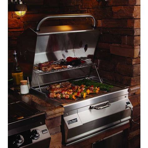 With the lid off you can have a fantastic portable grill that takes your steak, sausages, poultry, seafood and even vegetables to a charcoal fired wonderland of grilled ecstasy. Fire Magic Legacy Meat Smoker Charcoal Grill 24-Inch Built-In