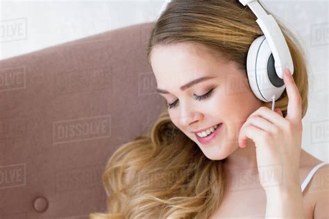 Happy Beautiful Girl Listening Music With Headphones Stock Photo