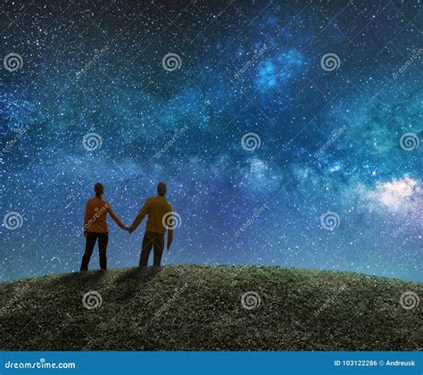 Couple Watching The Stars In Night Sky Stock Photo Image Of Fantasy