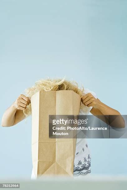 Paper Bag Head Woman Photos And Premium High Res Pictures Getty Images