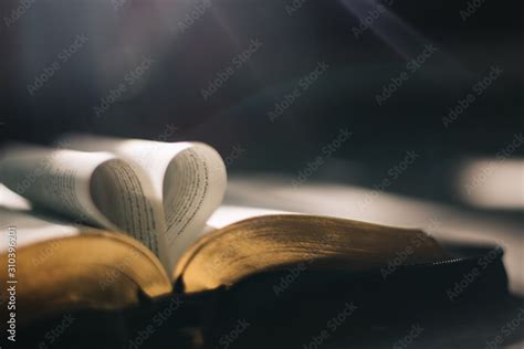 Soft Focus Open Holy Bible At Windowheart Pages Background Stock Photo
