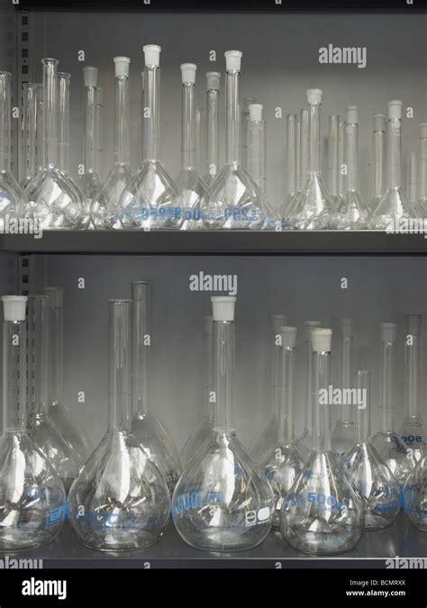 Closet With Lots Of Glass Lab Containers Glassware Stored On Shelves In Hospital Laboratory